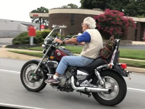 wind in his hair motorycle rider